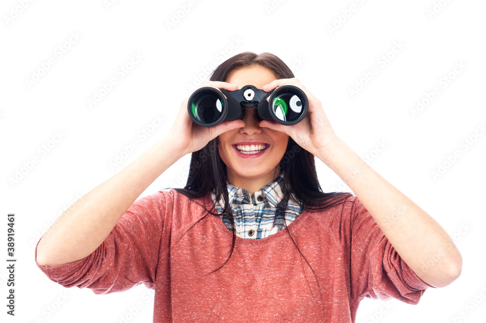 Woman looking through binoculars isolated on white Woman looking through binoculars isolated on white