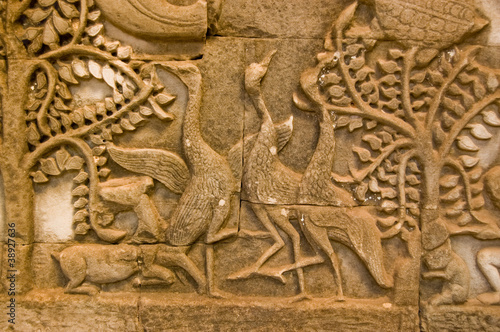 Ancient Khmer carving of three geese