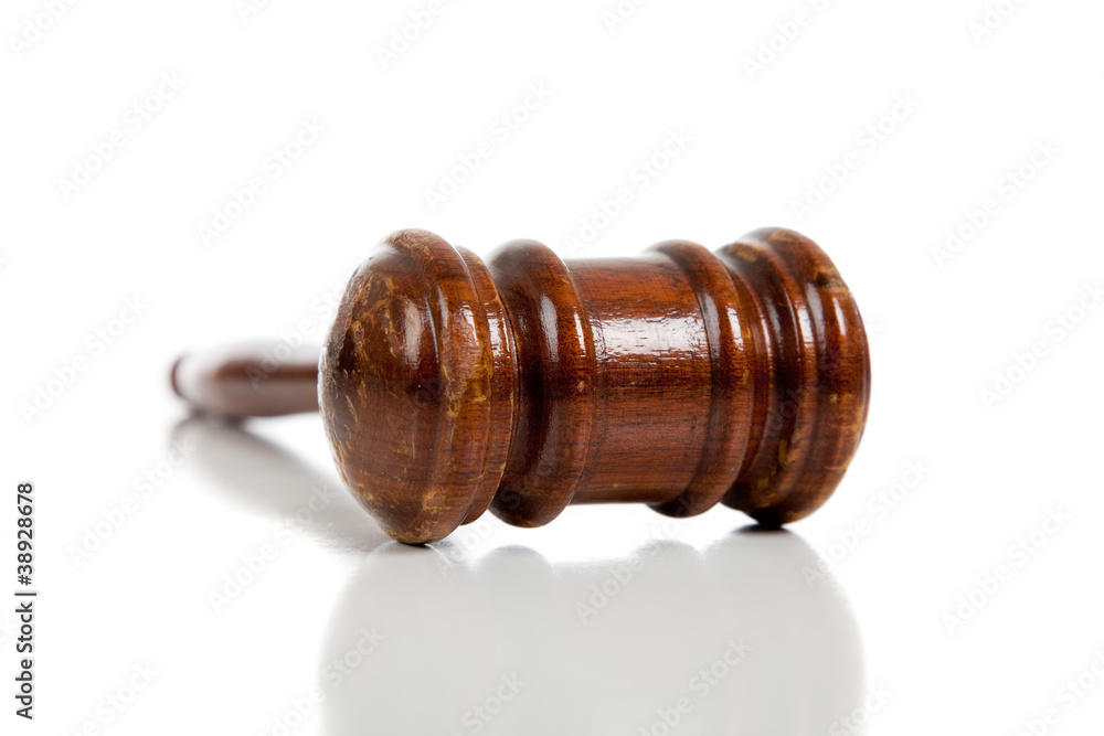 Brown gavel on a white background