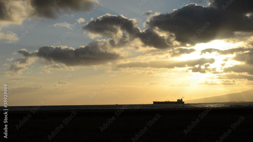 A Man And A Woman Jogging At Sunset In Hawaii