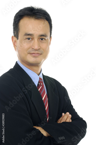 businessman looking at camera with a bright smile,