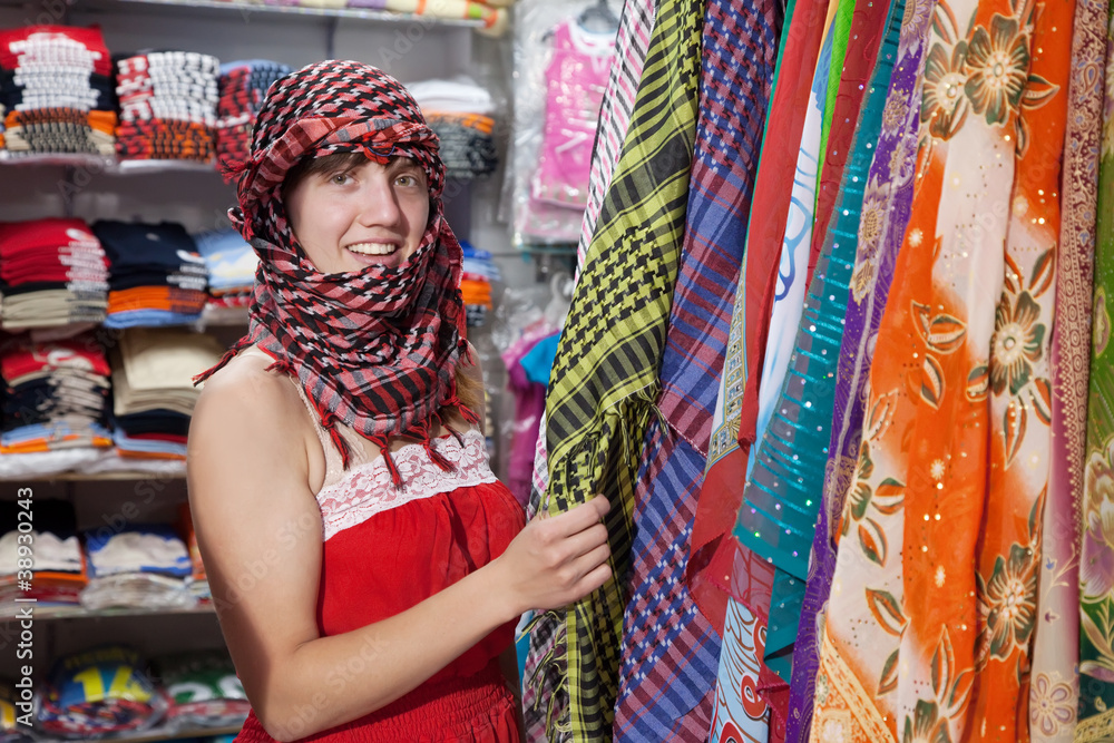 woman  chooses  egyptian shawl
