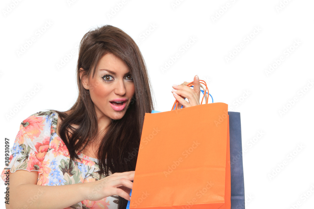 Portrait of stunning young woman carrying shopping bags Portrait of stunning young woman carrying shopping bags