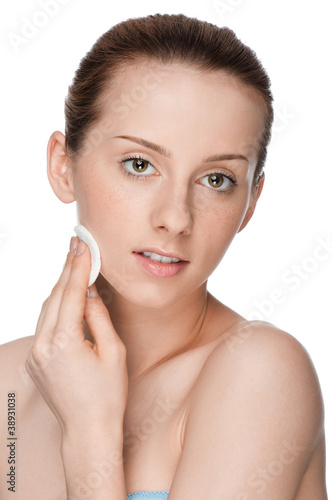 Young beautiful woman with clean sponge