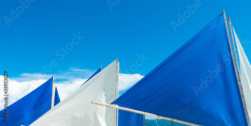 white and blue sails