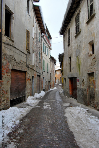 millesimo: antico borgo dell'entroterra ligure sotto la neve photo