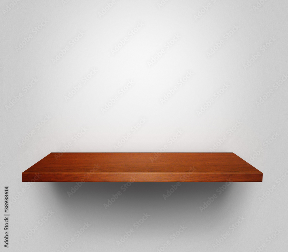 Empty shelf hanging at the wall Empty shelf hanging at the wall