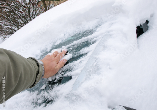Removing snow from car