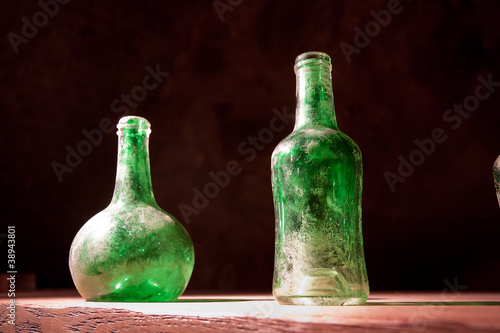 Dusty bottles on the table
