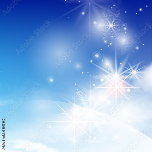 Blue winter abstract background with snowflakes © mika_48