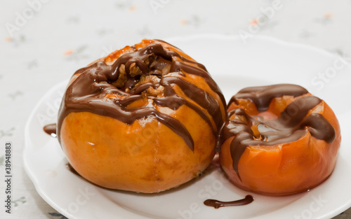 Baked apple and canned peach covered with chocolate
