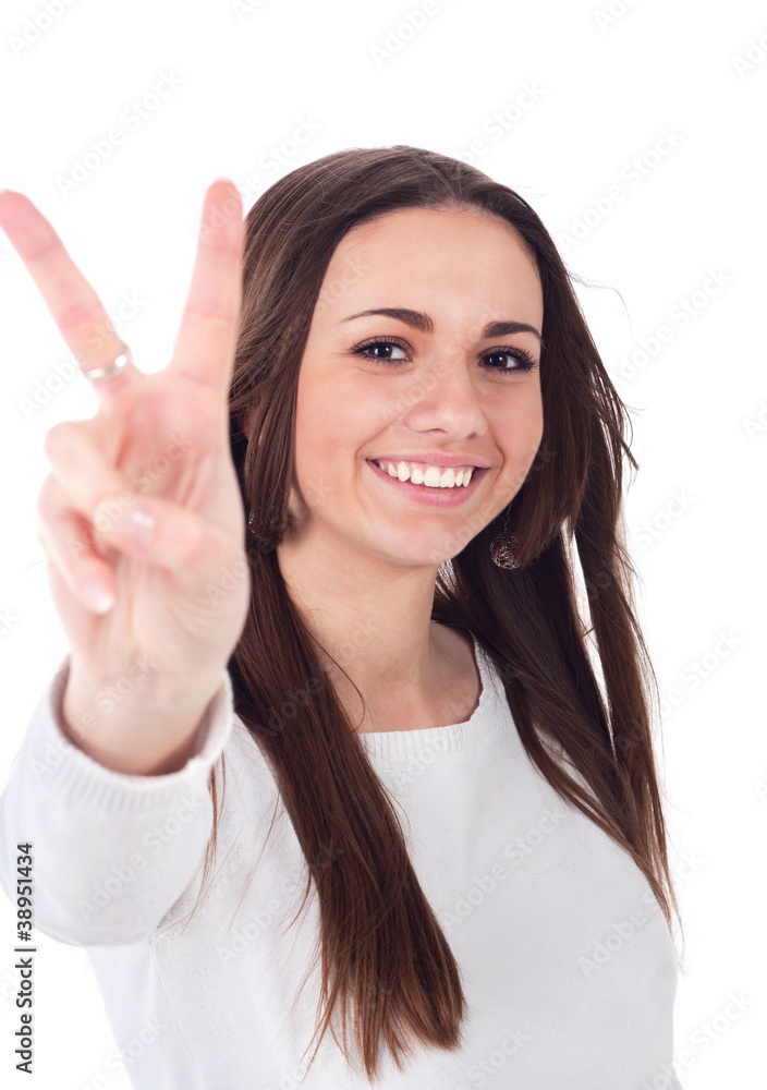 happy excited young woman showing the sign of victory happy excited young woman showing the sign of victory