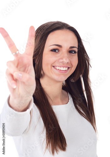 Wallpaper Mural happy excited young woman showing the sign of victory Torontodigital.ca