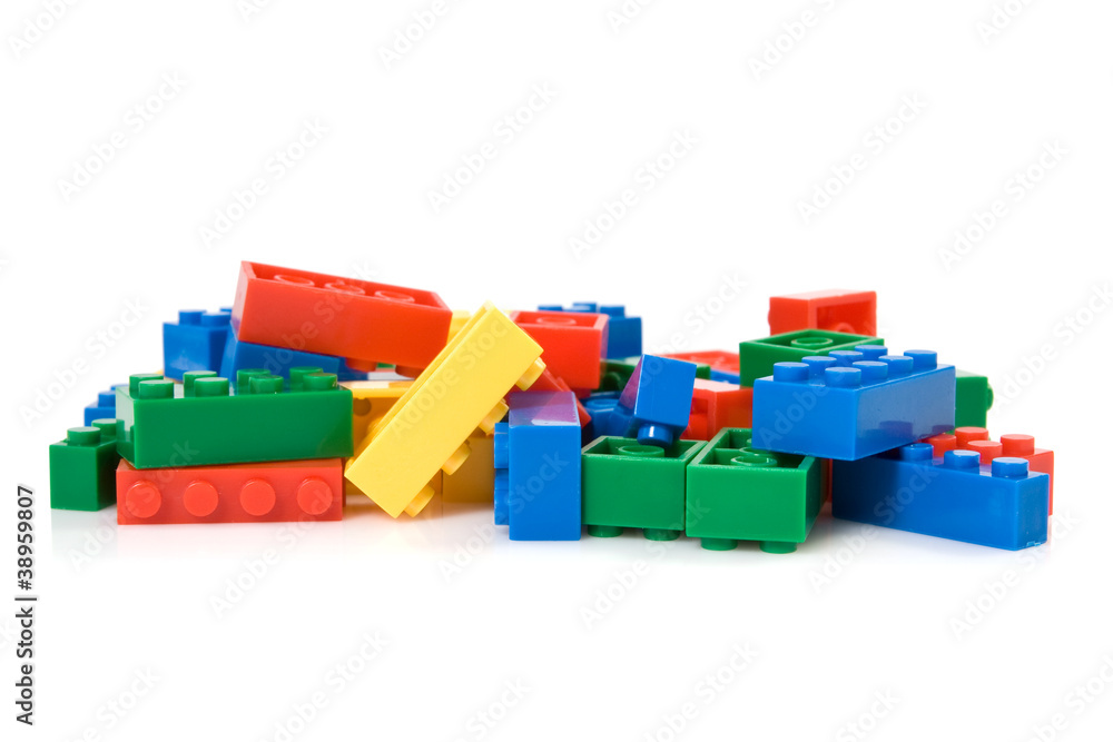 colorful plastic blocks over white background colorful plastic blocks over white background