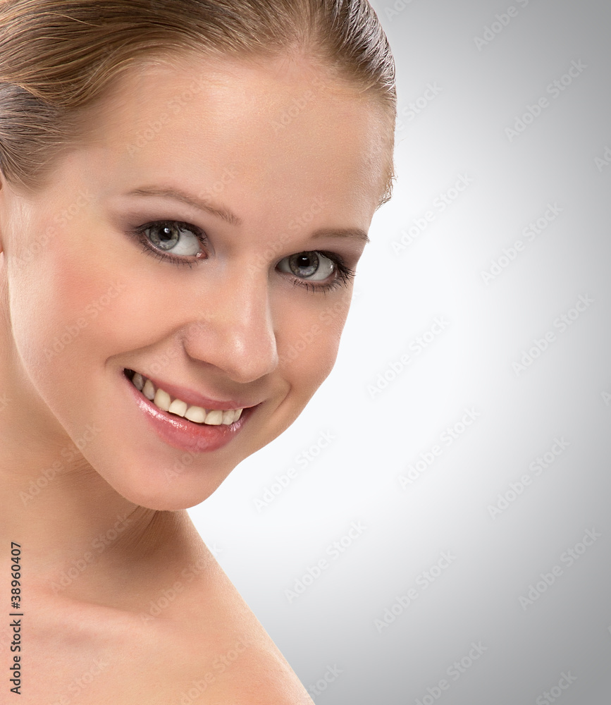 Fototapeta premium beautiful face a healthy young woman smiling