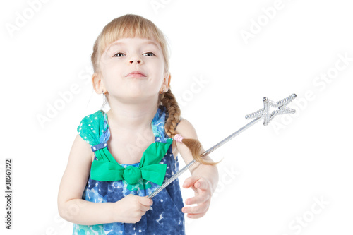 Little blonde girl with a magic wand