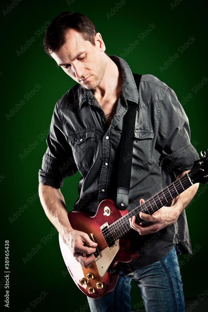 Obraz premium man with a guitar