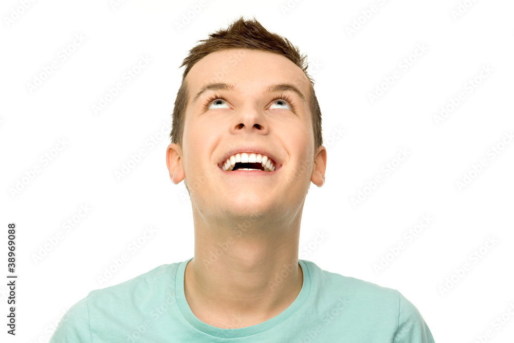 Fototapeta premium Młody człowiek patrząc w górę