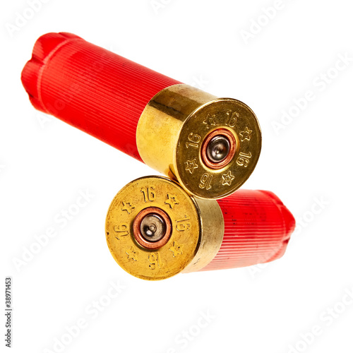 Red shotgun shells isolated over white background.