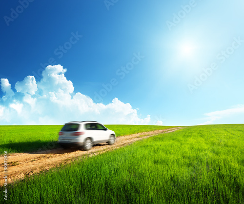 ground road and blurred car