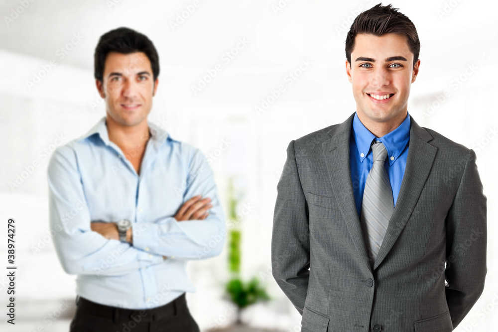 Young handsome businessmen partners Young handsome businessmen partners
