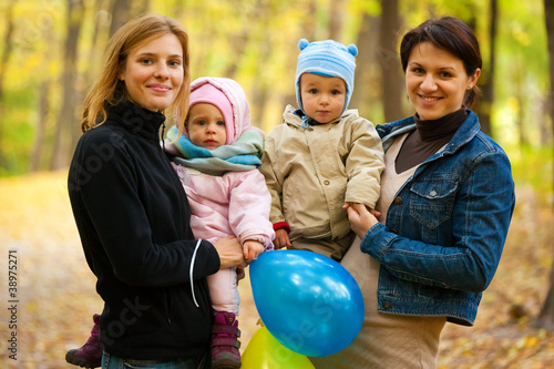 Two mothers with their babies