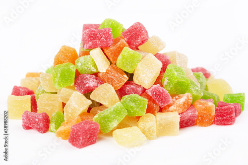 Colorful candied fruit on a white background