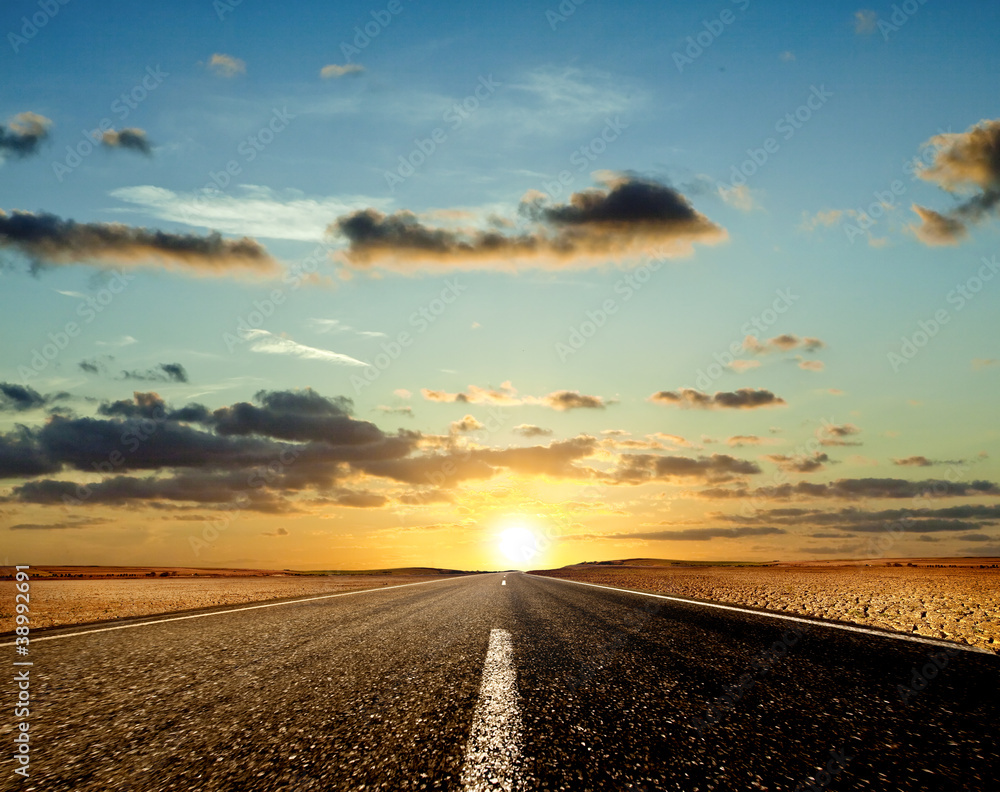 Road ahead and the sunset