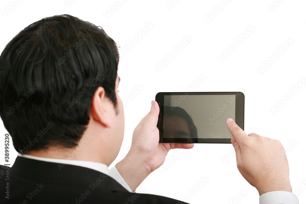 Businessman holding a blank touchpad pc, one finger touches the Businessman holding a blank touchpad pc, one finger touches the