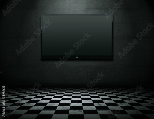 Flat screen TV in grunge empty interior with clipping path