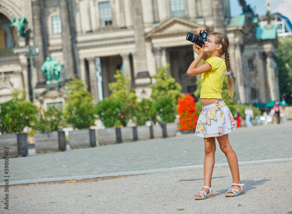 young girl with photo camera
