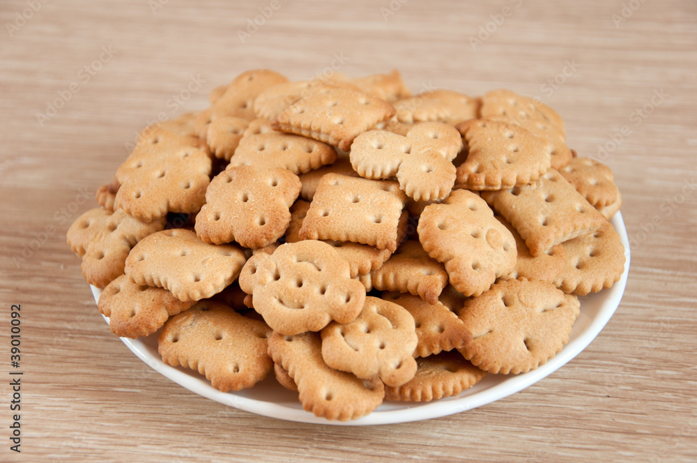 Children figured crackers on a plate Children figured crackers on a plate