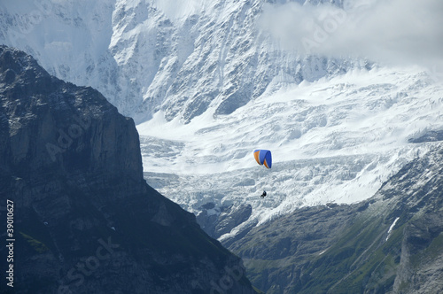 Hang glider against glacier on Wetterhorn