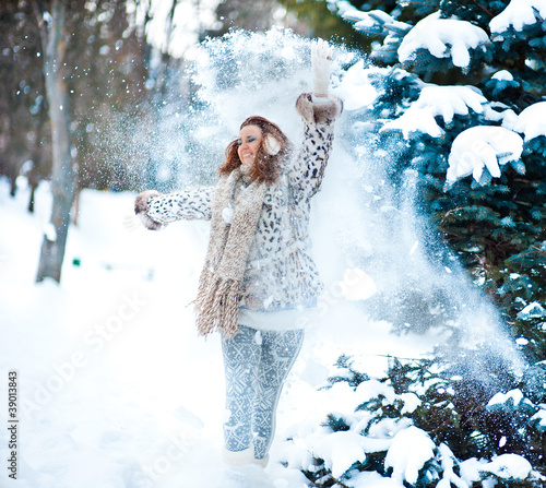 Girl in snowy forest