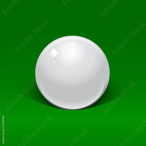 white billiard ball on a green background
