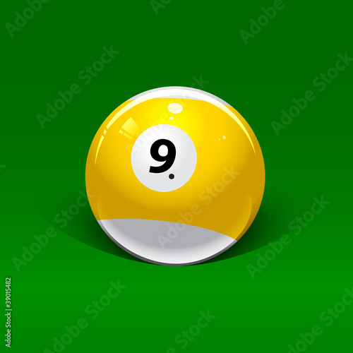 yellow-white billiard ball number nine on a green background