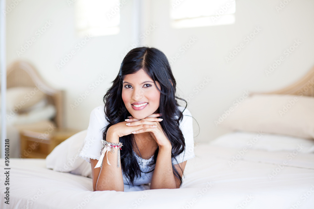 cute indian woman portrait on bed cute indian woman portrait on bed