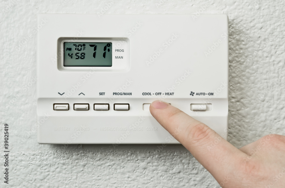 Hand adjusting thermostat Hand adjusting thermostat