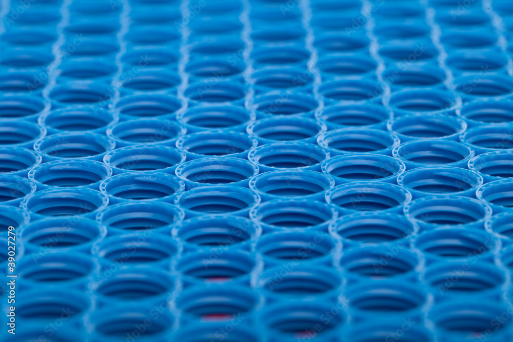 Naklejka premium Blue and red plastic caps background