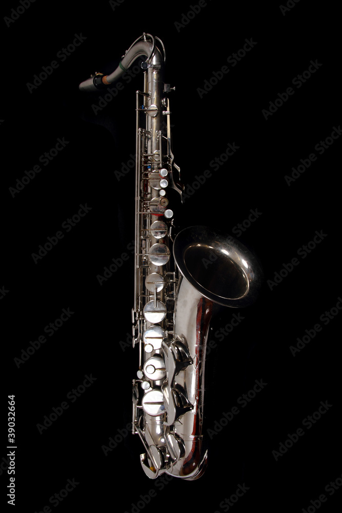 Obraz premium silver saxopphone isolated on the black background