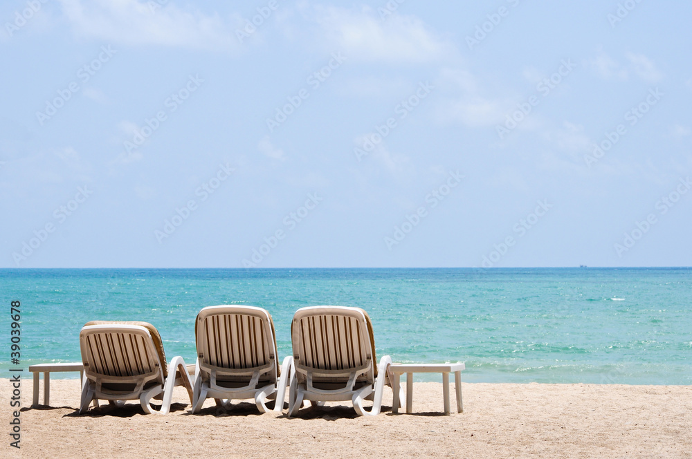 White sand beach beach chairs.