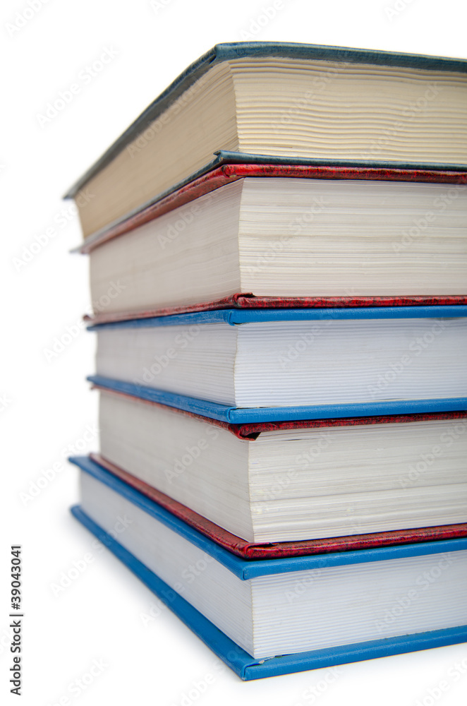 Books in high stack isolated on white Books in high stack isolated on white