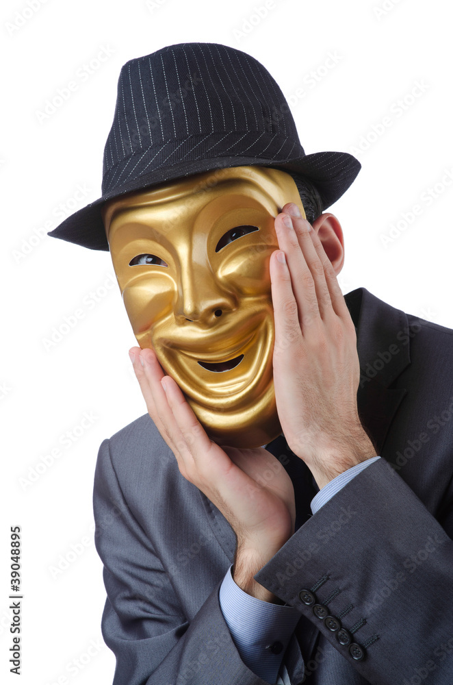 Businessman with mask concealing his identity Businessman with mask concealing his identity