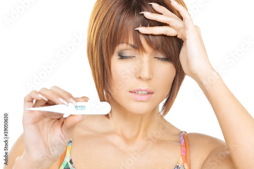 unhappy woman with thermometer