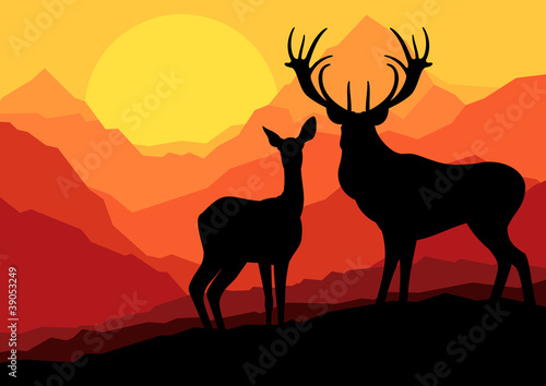 Deer family in wild mountain nature landscape background