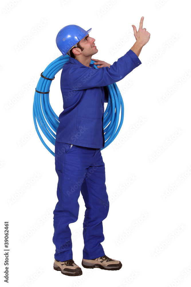 Man carrying coil
