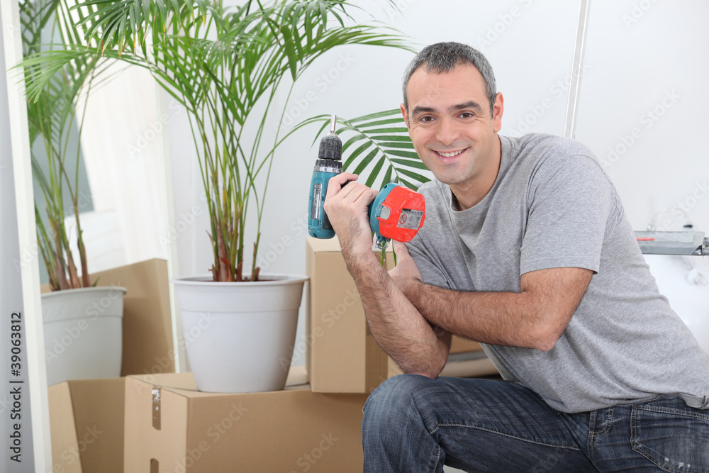 Man packing boxes for house move Man packing boxes for house move