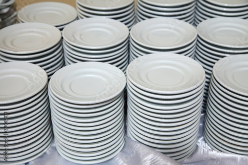 Many plates stacked together