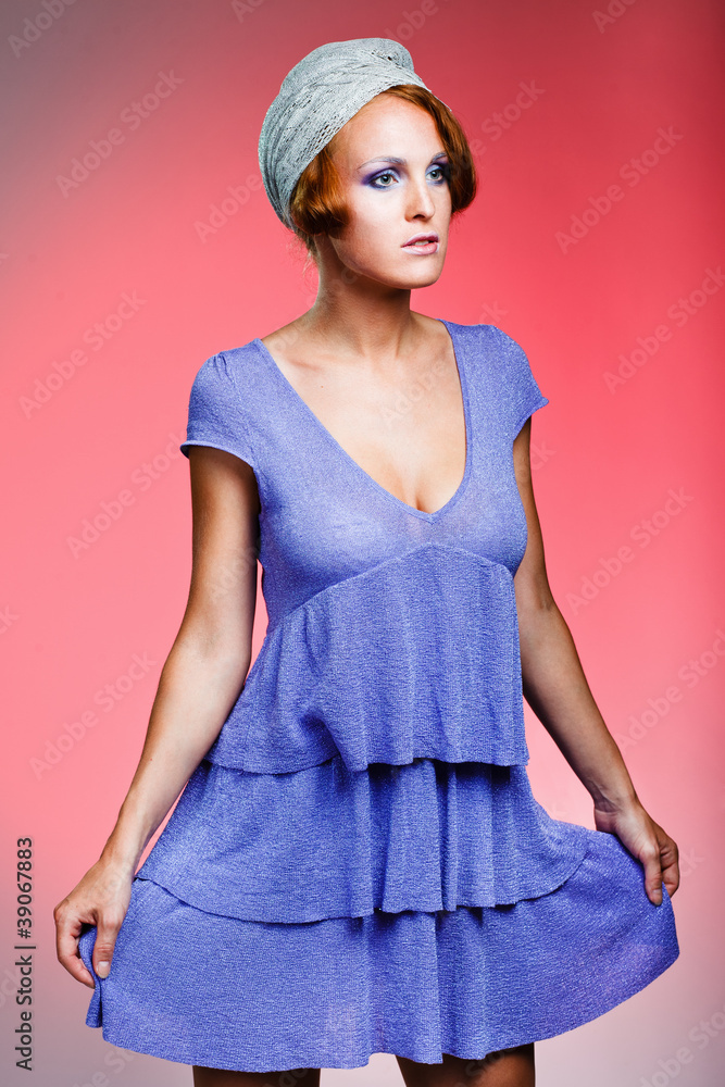 portrait of attractive retro-style girl in bonnet over red portrait of attractive retro-style girl in bonnet over red