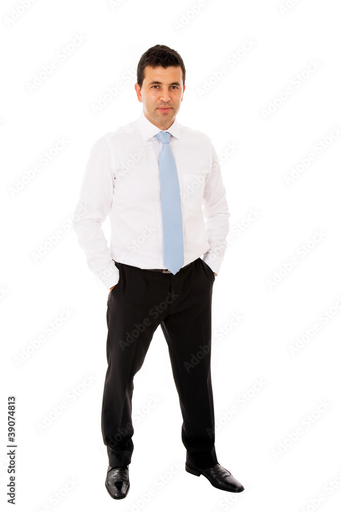 Young business man full body with hands in pockets. Isolated on Young business man full body with hands in pockets. Isolated on